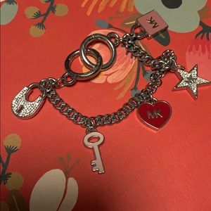 Never worn Michael Kors charm bracelet